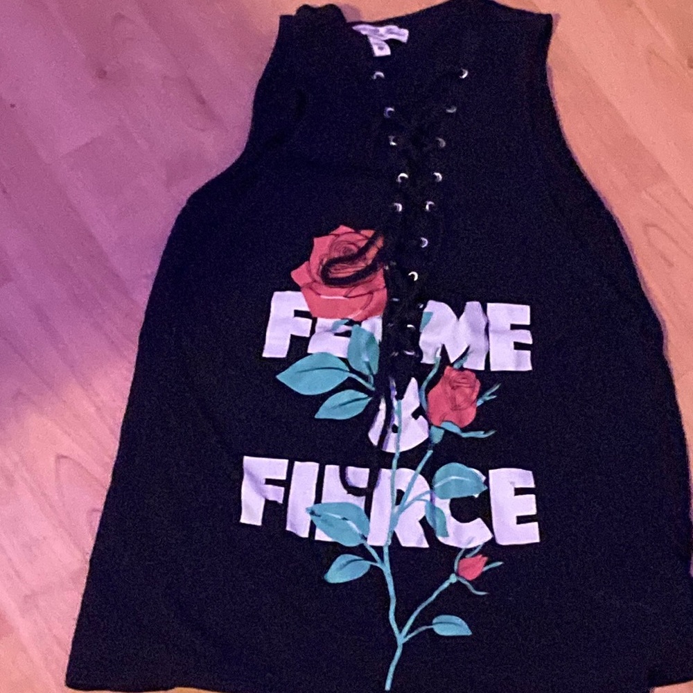 Cute woman shirt size small nice laced and cute wording.